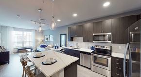 Brookfield apartment for rent - Luxury Apartments in Brookfield, WI - Brookfield Reserve Apartments Kitchen with Island and Stainless Steel Appliances