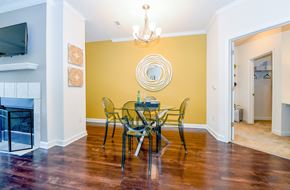 Wauwatosa apartment for rent - a dining room with a table and chairs and a fireplace