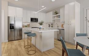 Davenport apartment for rent - A modern kitchen with a white island and stools.