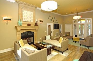 Wauwatosa apartment for rent - a living room with couches and chairs and a fireplace
