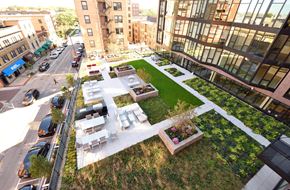 Evanston apartment for rent - Apartments in Evanston, IL - The Main Apartments Aerial View of Lushly Landscaped Courtyard Terrace with Multiple Seating Areas and BBQ Grill