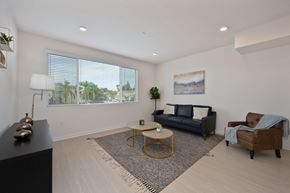 Montebello apartment for rent - a living room with a couch and a chair and a coffee table