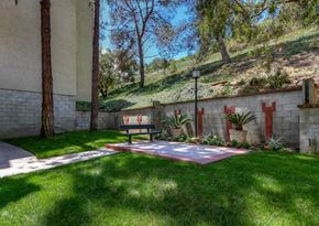 San Diego apartment for rent - a backyard with a table and a fire pit