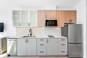 San Diego apartment for rent - kitchen cabinets and sink and fridge