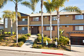 Oceanside apartment for rent - Exterior of Elan Sealofts Apartment building with the controlled access entrance to the parking garage.
