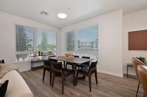 Reno apartment for rent - A dining room with a table and chairs.