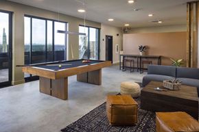 National City apartment for rent - A room with a pool table and a couch.
