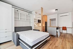 National City apartment for rent - A bedroom with a bed, desk, and chair.