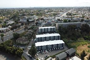San Diego apartment for rent - 3 apartment buildings from a high-up drone exterior view