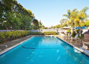 Solana Beach apartment for rent - a swimming pool in a backyard with a resort style pool