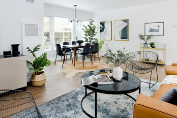 Inglewood apartment for rent - A living room with a black coffee table and a brown leather couch.