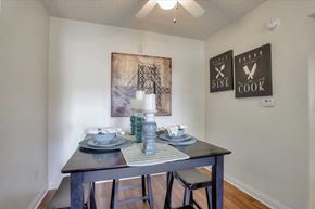 Las Vegas apartment for rent - A dining room with a table set for two.