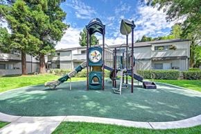 Modesto apartment for rent - The playground at The Redwoods with slides.
