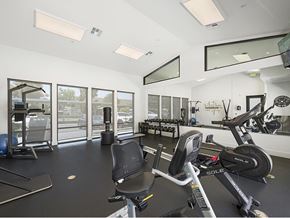 Santee apartment for rent - A gym with a treadmill, exercise bike, and other equipment.