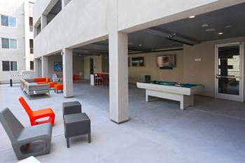 Fourth floor game lounge that includes pool table, foosball, and comfortable lounges