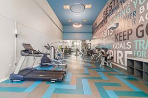 Beaverton apartment for rent - Fitness center with weight and cardio machines.