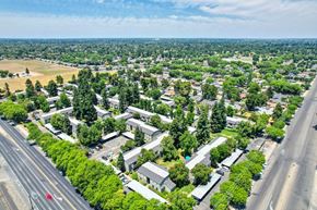 Modesto apartment for rent - Aerial neighborhood and The Redwoods view with cross streets and gorgeous blue sky.
