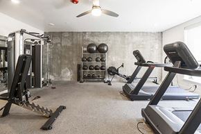 Sacramento apartment for rent - a home gym with treadmills and weights