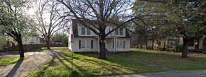 Denton apartment for rent - A white house with a tree in front of it.