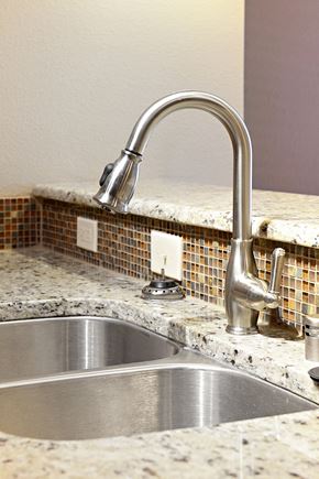 Denton apartment for rent - Kitchen sink with a chrome faucet at H Squared Apartments, Denton, TX, Texas, 76201