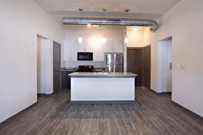 Denton apartment for rent - Kitchen with lights at East End Lofts at the Railyard Apartments, Denton, Texas