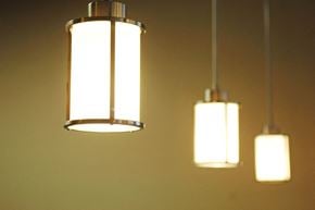 Denton apartment for rent - Two hanging lights with a warm glow at Centre Place Apartments, Denton, 76205