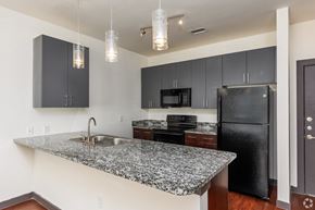 Denton apartment for rent - Kitchen counter at SEVEN TWELVE LOFTS Apartments, Denton, Texas