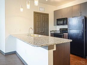 Denton apartment for rent - Kitchen at SEVEN TWELVE LOFTS Apartments, Denton, TX, 76201