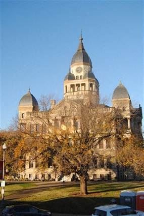 Denton apartment for rent - a large building with a tree in front of it