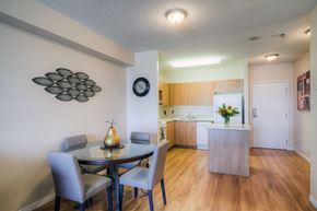 Kingston apartment for rent - A dining room with a table and chairs.