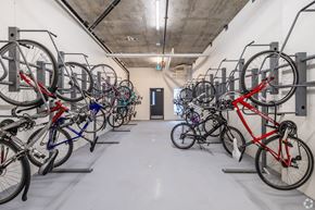Kingston apartment for rent - a group of bikes parked in a white room