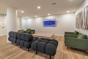 Kingston apartment for rent - a living room with couches and chairs and a table