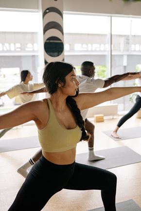 Tamarac apartment for rent - a group of people doing yoga in a gym