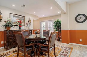 Houston apartment for rent - A dining room with a table set for four.