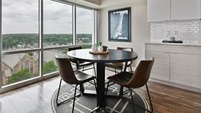 Indianapolis apartment for rent - Cozy dining room with large windows and view of the city at CityView on Meridian, Indianapolis, IN,46208