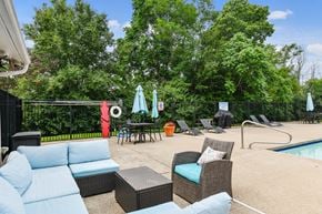 Cincinnati apartment for rent - Grilling and lounge area by the poolside at Heritage Hill Estates Apartments, Cincinnati, Ohio 45227
