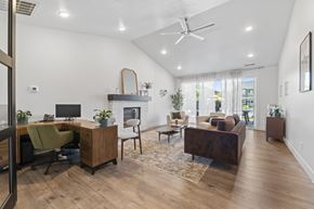 Nampa apartment for rent - A spacious living room with a home office area.