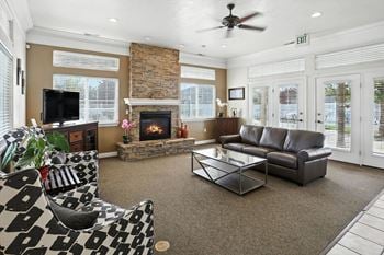 Clubroom with tv and fireplace