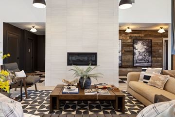 Billings apartment for rent - a living room with a fireplace and a coffee table