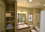 Bozeman apartment for rent - A bathroom with a sink, toilet, and shower at Saddleview Apartments, Bozeman, MT.