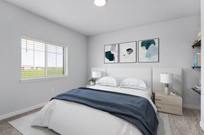 Billings apartment for rent - A bedroom with a large bed and a window with blinds.
