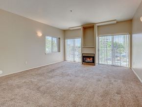Boise apartment for rent - Carpeted Living Area at C.W. Moore Apartments, Boise