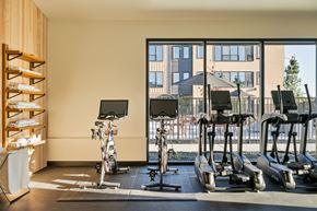 Idaho Falls apartment for rent - A gym with treadmills, exercise bikes and a rowing machine.