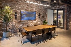 Boise apartment for rent - A conference room with a long table and chairs.
