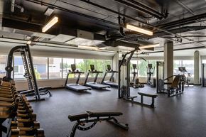 Garden City apartment for rent - a gym with treadmills and other exercise equipment in a building with windows at Crosshatch, Garden City, ID, 83714