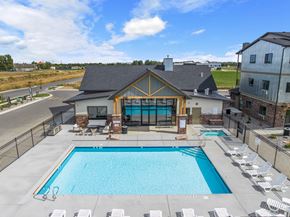 Billings apartment for rent - A large outdoor swimming pool with lounge chairs at The Expo in Billings, MT,