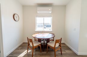 Kalispell apartment for rent - A dining room with a table and chairs. at Silverbrook Apartments, Kalispell, Montana