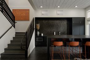 Boise apartment for rent - a dining room with a table and chairs and a staircase at The Lucy Boise Apartments, Boise, ID