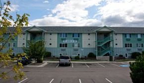 Missoula apartment for rent - building with a parking lot at Great Northern, Montana