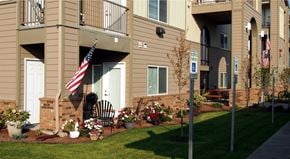 Post Falls apartment for rent - an flag in front of an apartment building
